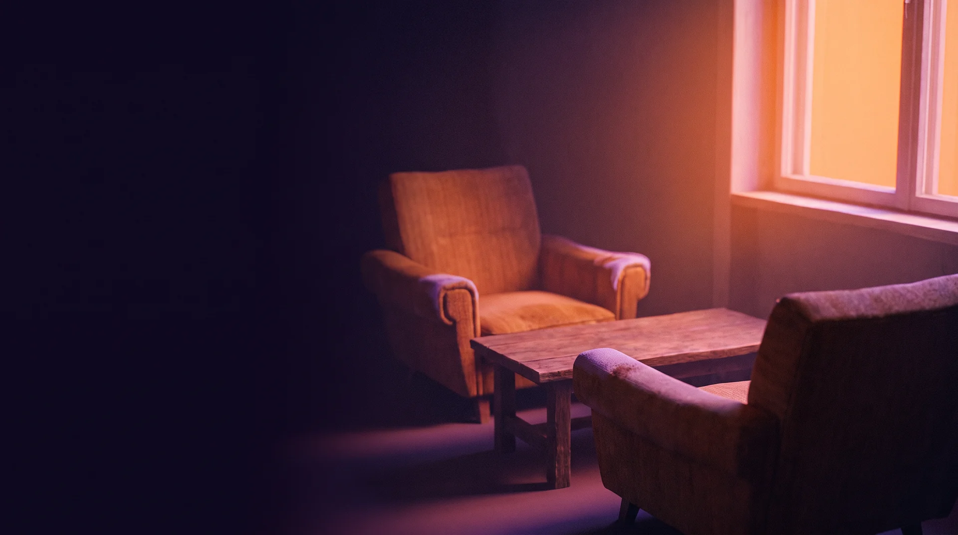 Deux fauteuils qui se font face dans une pièce calme, personne assis